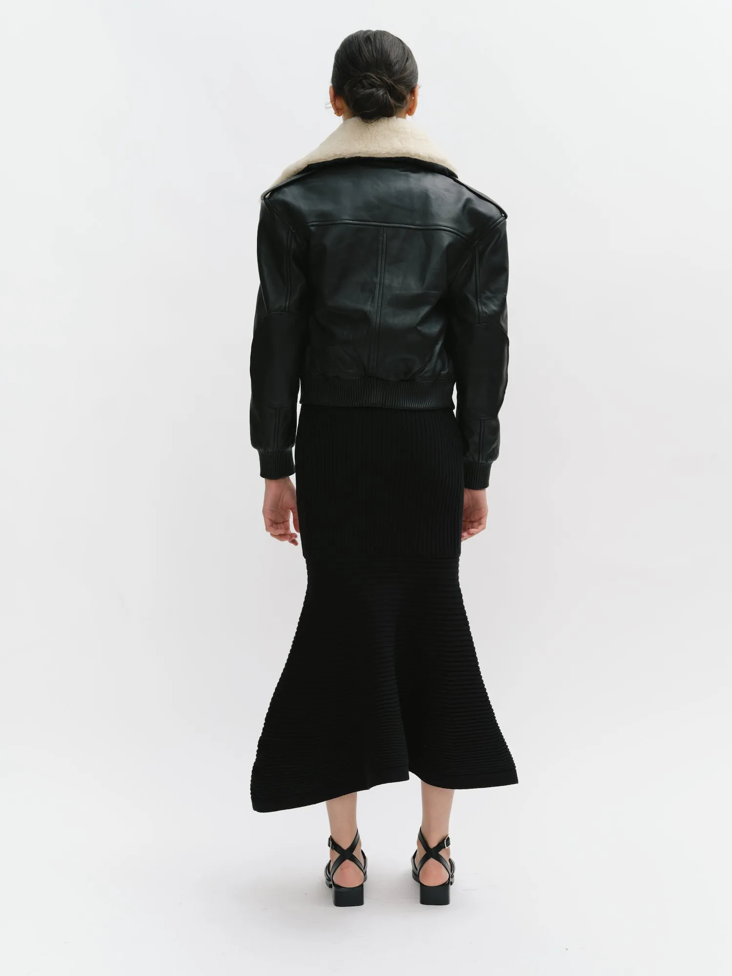 Leather bomber with shearling collar